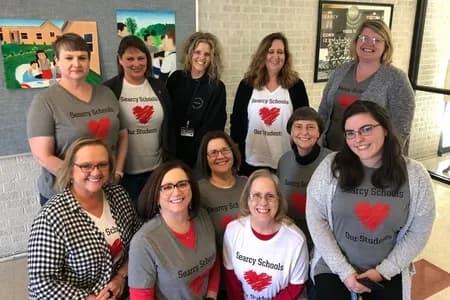 teachers in their gift shirts