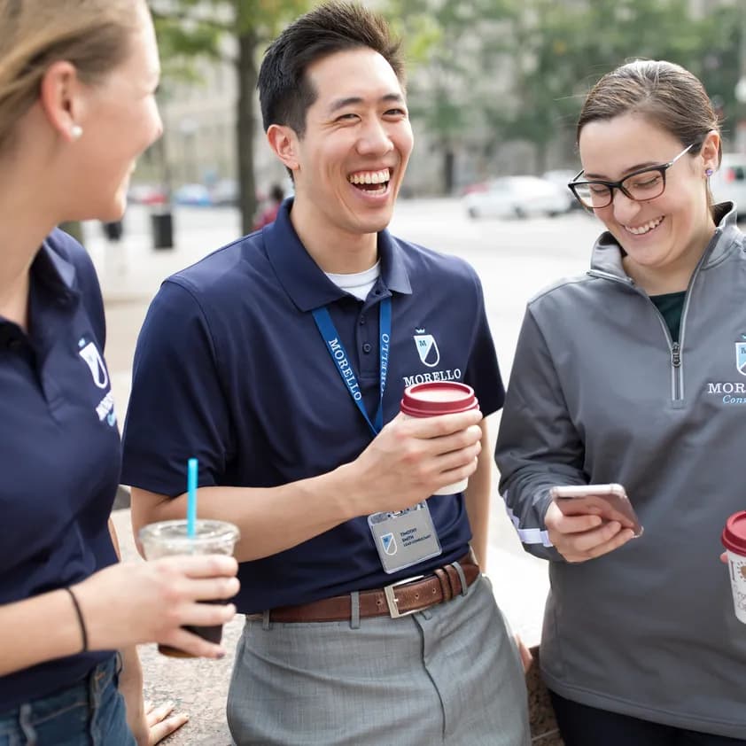 consultants wearing professional-looking uniforms and quarter zips