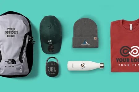 Assorted custom branded merchandise including backpack, hat, beanie, water bottle, speaker, and t-shirt featuring company logos.