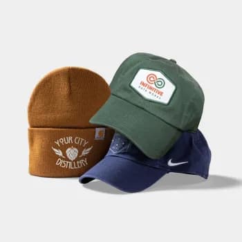 Two baseball hats and a Carhartt beanie