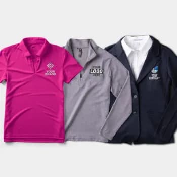 A polo shirt, button up, and blazer are laid one on top of the other.