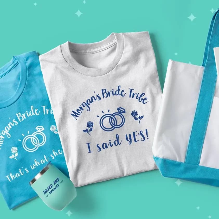 A laydown of products including custom t-shirts, tumbler, hat, notebook, and totebag feature bachelorette sayings.