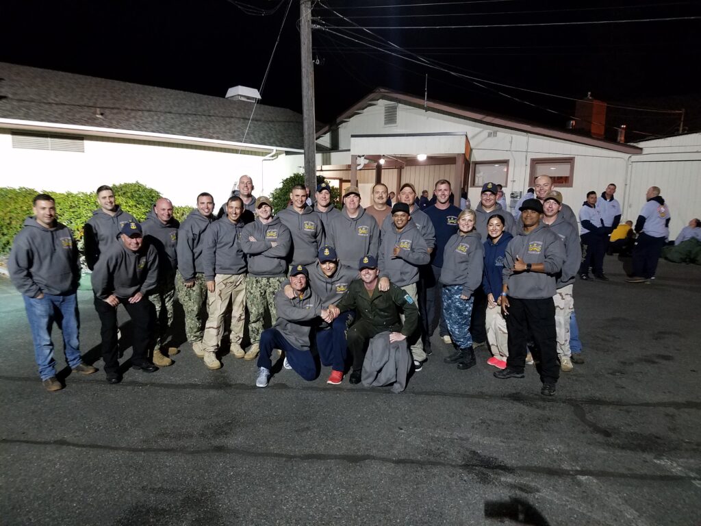 A Naval squadron welcomes its new chief officers with matching custom hoodies. 