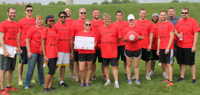 accounting team kicking assets photo