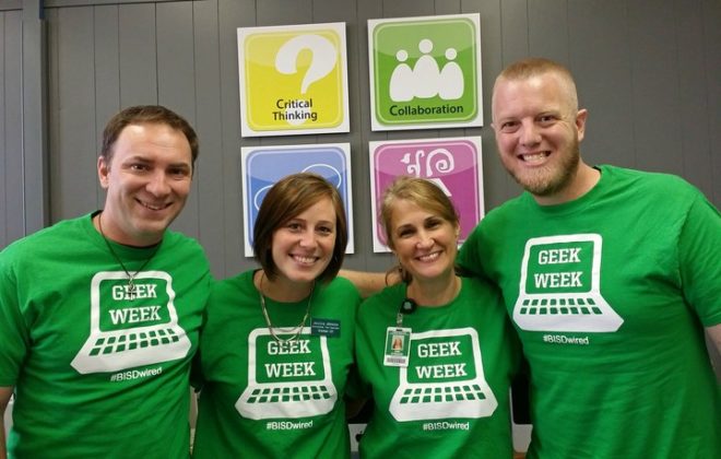 Programming team members in custom developer team apparel