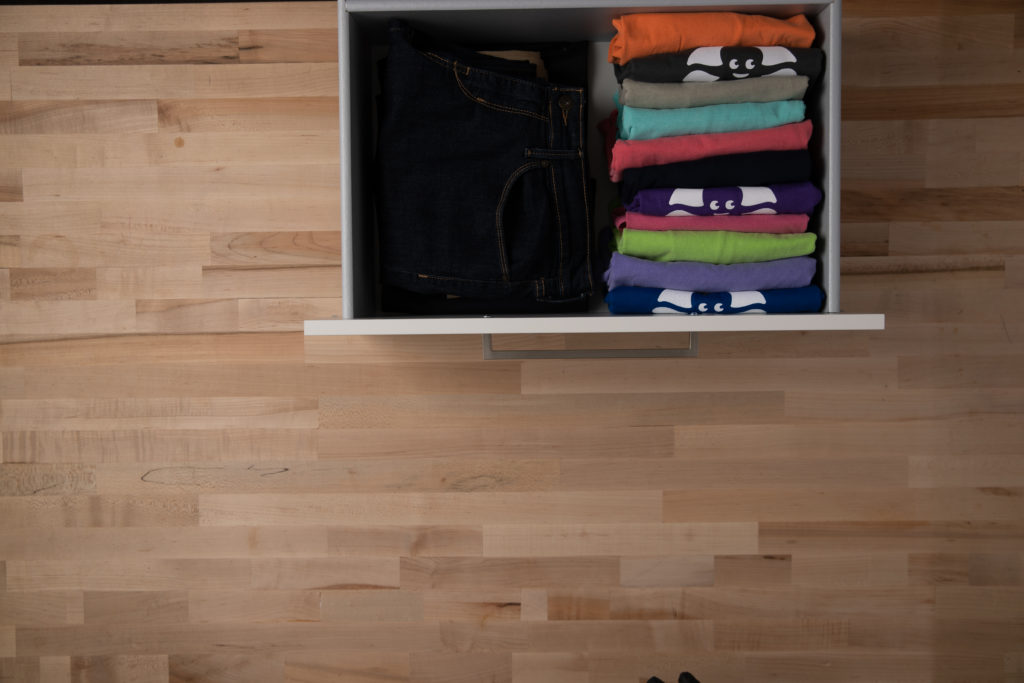 shirts stacked in drawer