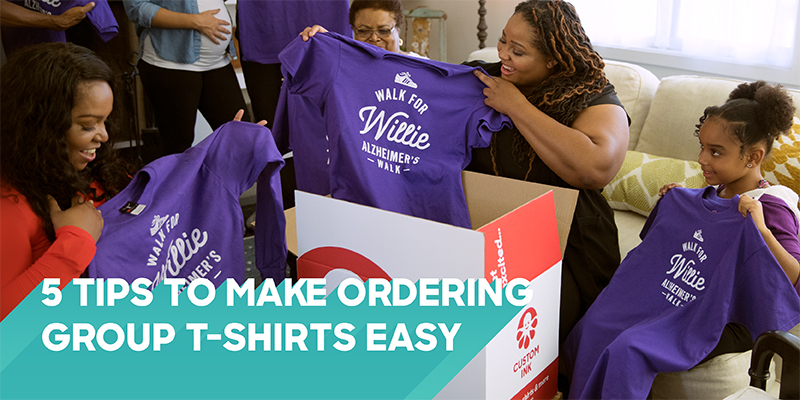 a group unboxing their shirts