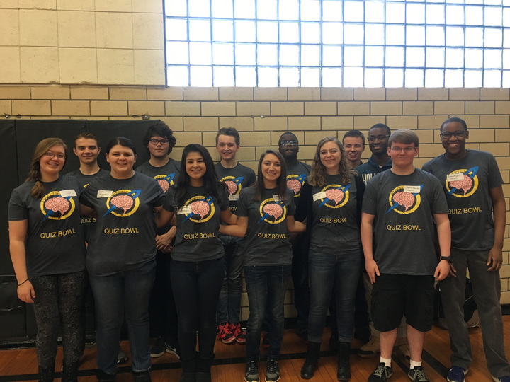 Quiz bowl team in matching custom apparel at their academic competition