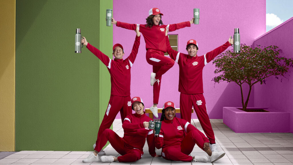 Janine crew holding tumblers