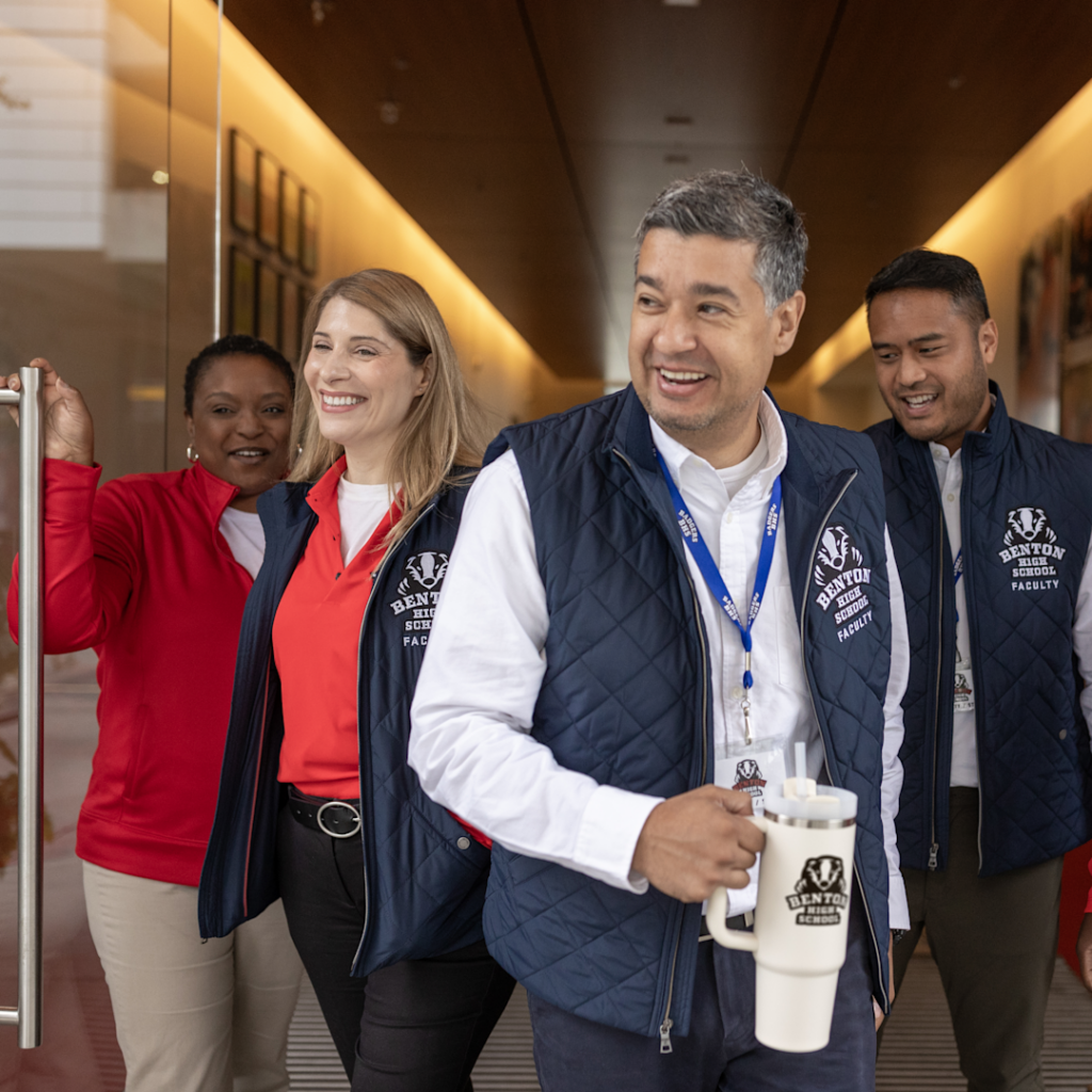 school staff wearing their personalized gifts